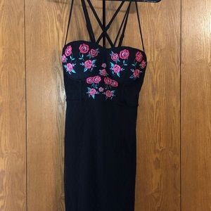 Black spaghetti strap dress.